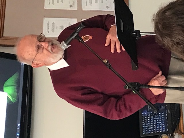 Pastor Wally Schiller addressing Kaffee und Kuchen members